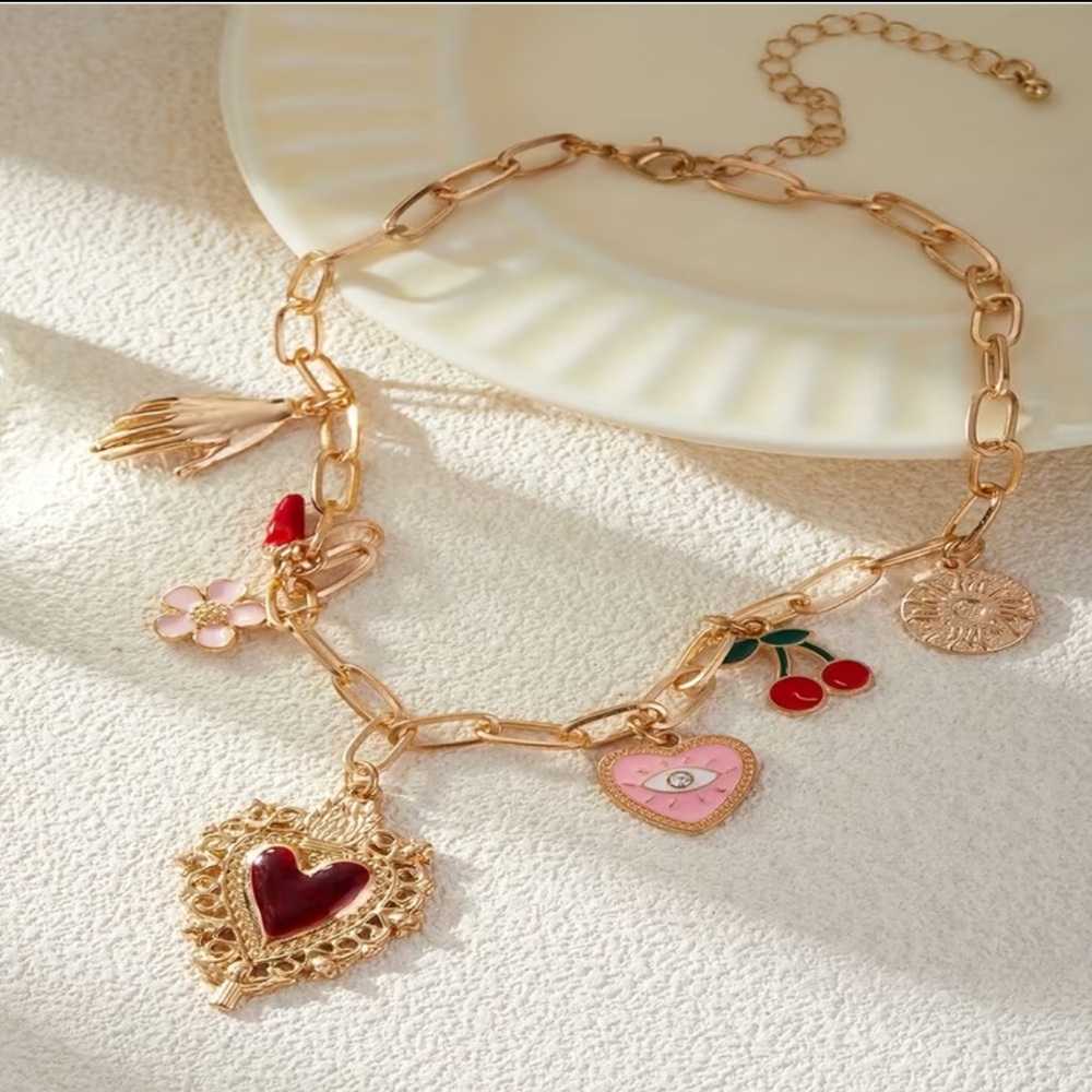Gold Pendant Charm Necklace with Red and Pink Accents